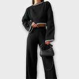 Kootud komplekt lühikese pluusi ja peente detailidega