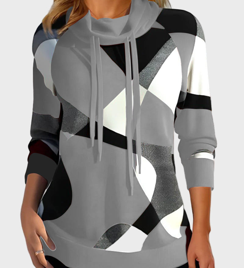 Kootud dressipluus kunstilise kujunduse ja kapuutsiga