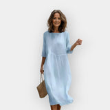 Um vestido com uma cobertura favorecedora na zona da barriga.