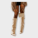 Elegantse disainiga kõrged saapad