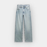 Lõdvestunud lõigaga teksad