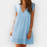 Vestido de verão com calções embutidos e bolsos.