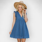 Vestido de verão com calções embutidos e bolsos.