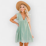 Vestido de verão com calções embutidos e bolsos.