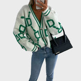 Moodne kootud vest geomeetrilise mustriga