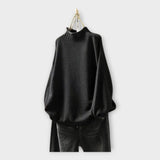 Kootud kampsun kõrge kraega