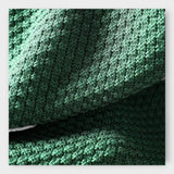 Kootud kampsun kõrge kraega