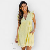 Vestido de verão com calções embutidos e bolsos.