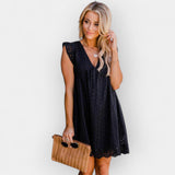 Vestido de verão com calções embutidos e bolsos.