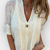 Kootud topp V-kaelusega ja nööbiga