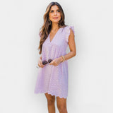 Vestido de verão com calções embutidos e bolsos.